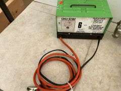 2 ton chain hoist, 6 amp battery charger - owner says works, and a #8 food grinder