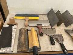 Quantity of drywall trowels and sanding  blocks etc.