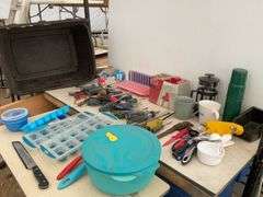 Plastic tote, quantity of screwdrivers, sawhorse brackets, miscellaneous measuring cups, ice cube tr