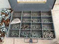 Sheet metal kit of screws, quantity of 1/2" by 1 1/2" carriage bolts, miscellaneous screws, small ch