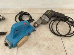 Running 1/4" Black & Decker and 1/2" drills, working Makita hand planer