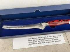 Unused  7" Damascus, steel filleting knife