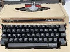 Vintage electric typewriter in case