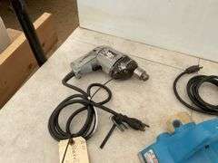 Running 1/4" Black & Decker and 1/2" drills, working Makita hand planer