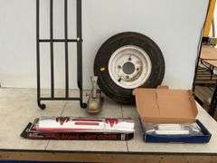 4.8 0x8 tire and four bolt hole rim, 1 7/8" hitch coupler, third brake light cover for a Dodge, end