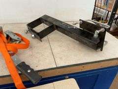 Ratcheting strap, spare tire carrier