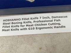 Unused  7" Damascus, steel filleting knife