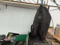 Pair of snowboarding bindings, gears, handlebar bag, Coleman camp stove, garment bag, miscellaneous