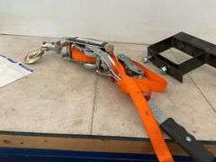 Ratcheting strap, spare tire carrier