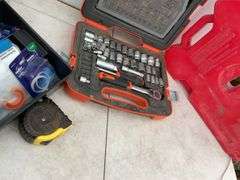 Plastic toolbox 9"Wx7"Hx20"L, comes with miscellaneous tools, 3/8" drive SAE and metric socket set, 7 1/2 L gas jug