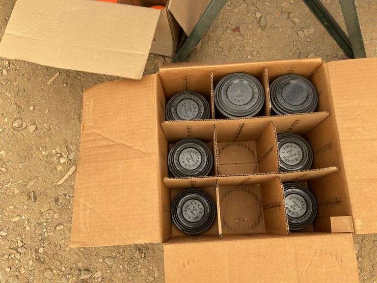 Clay pigeon thrower and a quantity of clay pigeons