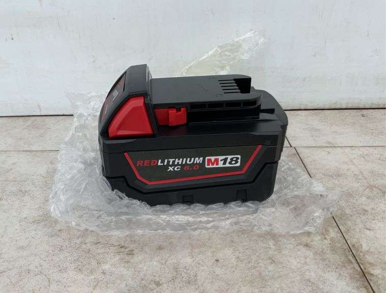 Milwaukee 18 V Red Lithium M 18 battery XC 6.0. Unused