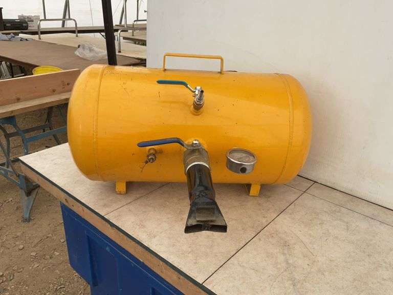 Portable air tank comes with the attachment to set  tire beads.