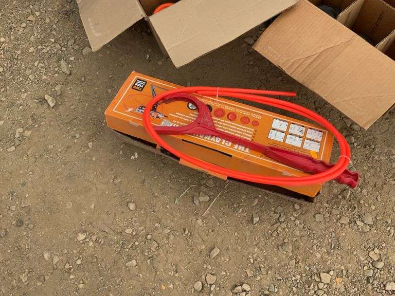 Clay pigeon thrower and a quantity of clay pigeons