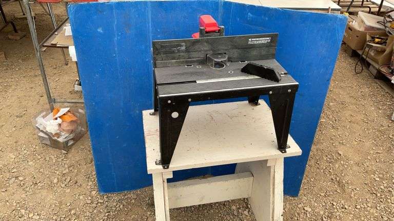 Router stand on shop built table