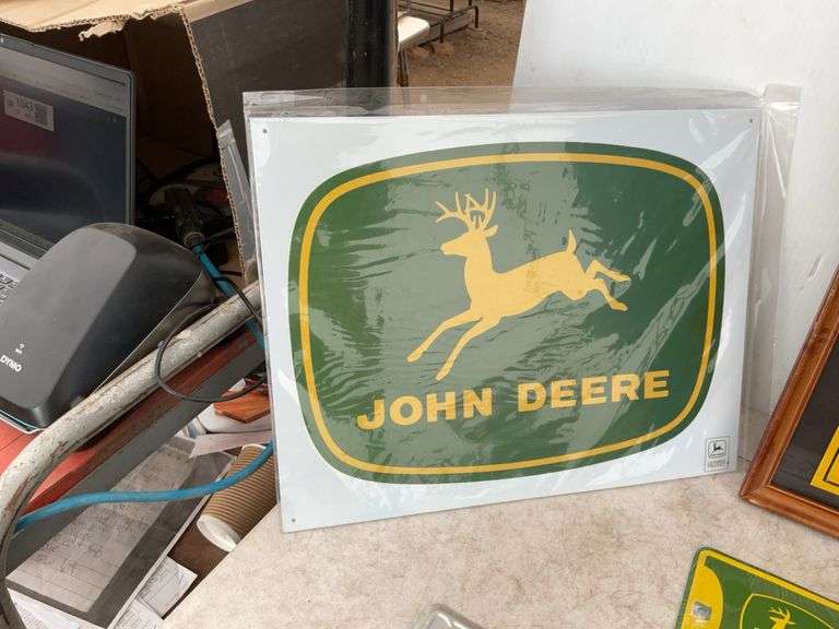 Quantity of John Deere license plates, print etc