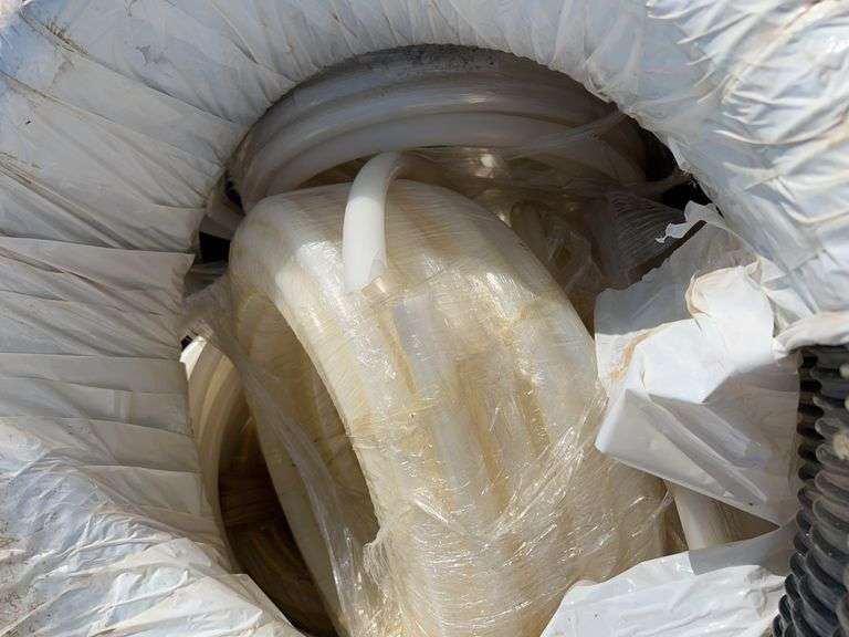 Crate of misc poly hose 2-1/2 canaflex air seeder hose & 1” air seeder hose