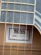 Pair of guitars one is acoustic Nova Model 4002BX, and an electric guitar - condition unknown