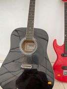 Pair of guitars one is acoustic Nova Model 4002BX, and an electric guitar - condition unknown