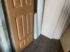 10 - unused 28” x 80” interior doors, several door jams, 1 - 24” x 80" interior door