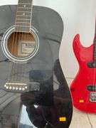 Pair of guitars one is acoustic Nova Model 4002BX, and an electric guitar - condition unknown