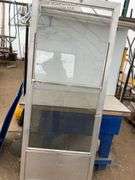 Used 32 x 80 storm door comes with screen