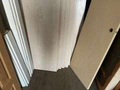 10 - unused 28” x 80” interior doors, several door jams, 1 - 24” x 80" interior door