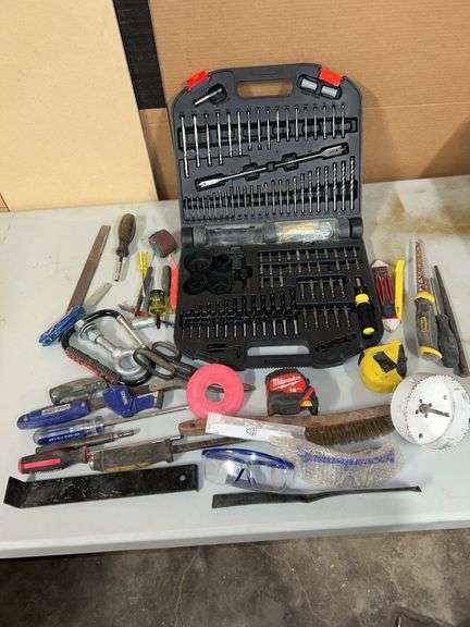 Drill bit set, misc tools, tape measures, screwdriver,  etc
