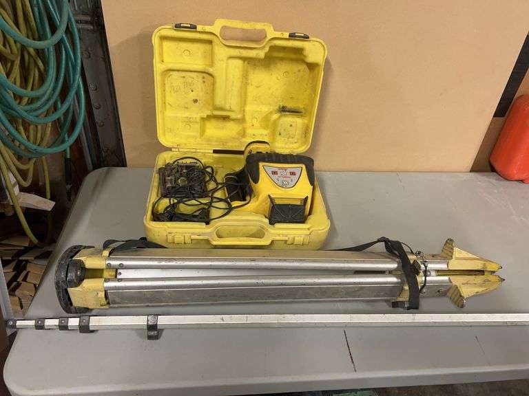Rugby 100 Self Leveling Laser - comes with case, tripod and measure stick - works