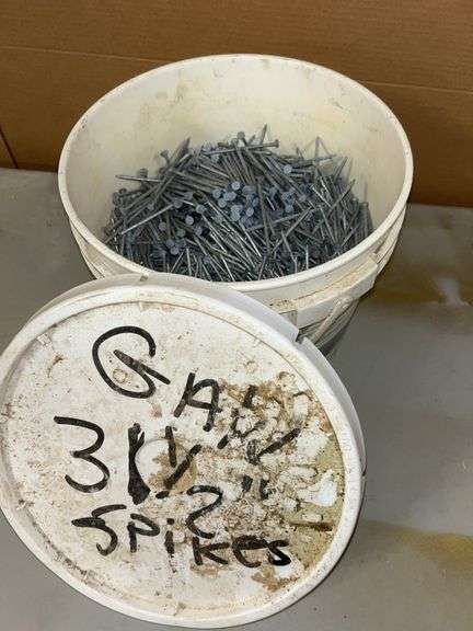 Pail of galvanized 3-1/2” spikes