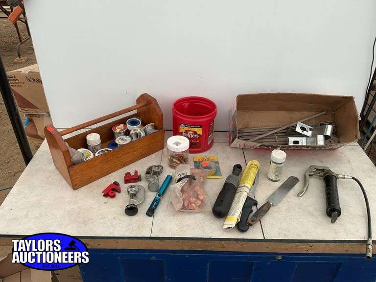 Mini grease gun, tubing cutters, quantity of solder, 12 inch spikes, etc.