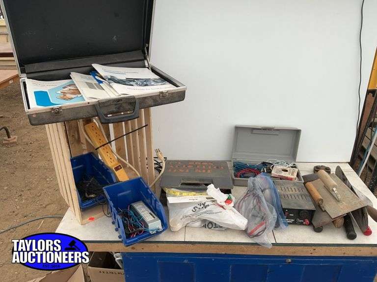 Quantity of electrical wiring pieces, trowels, hatchet, 12 V power supply, bolt cutters etc.