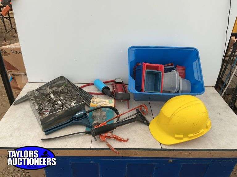Hose clamps, shelf brackets, strap wrench, scraper, hardhat, miscellaneous containers etc.