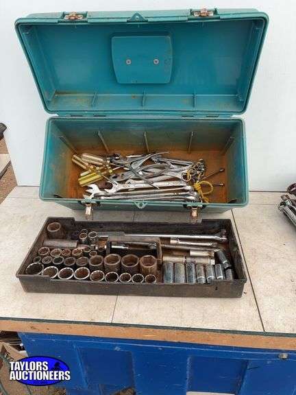 Plastic toolbox with a quantity of tools