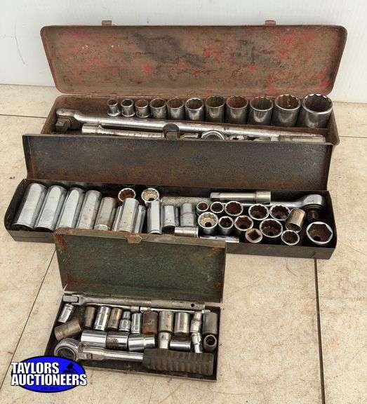 Quantity of 1/4", 3/8", and 1/2" drive SAE sockets