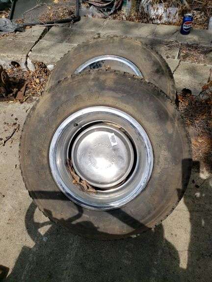 2 Goodyear Wrangler Tires With Rims & Hubcaps P235/75R15 - Trice Auctions