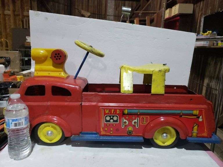 Red and Yellow Fire Department-Themed Toy Ride-On Truck - Trice Auctions