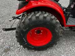 2024 Kioti CX2510 Farm Tractor Package WITH Attachments and 2024 Direct T/A Tag Trailer