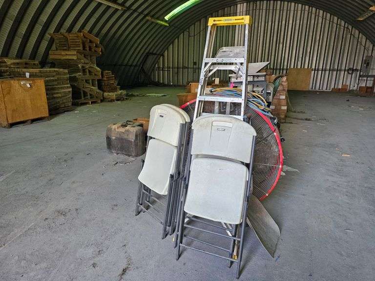 Lot of four folding chairs, step ladder and barrel fan
