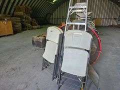 Lot of four folding chairs, step ladder and barrel fan