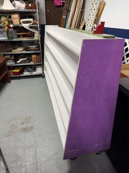 Double sided fixture. Probably blockbuster item. Wheels not included.