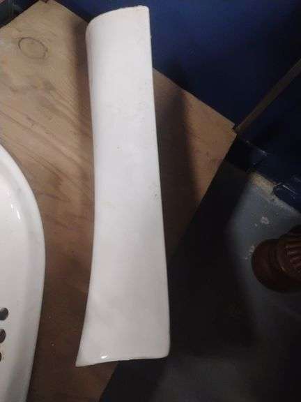 Pedestal sink with faucet , white.