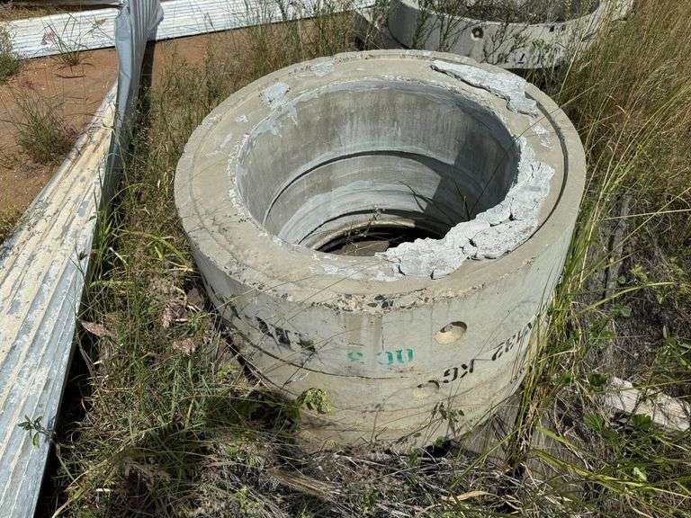 Assorted Concrete Pipe, Poly Hose and Concrete Pit