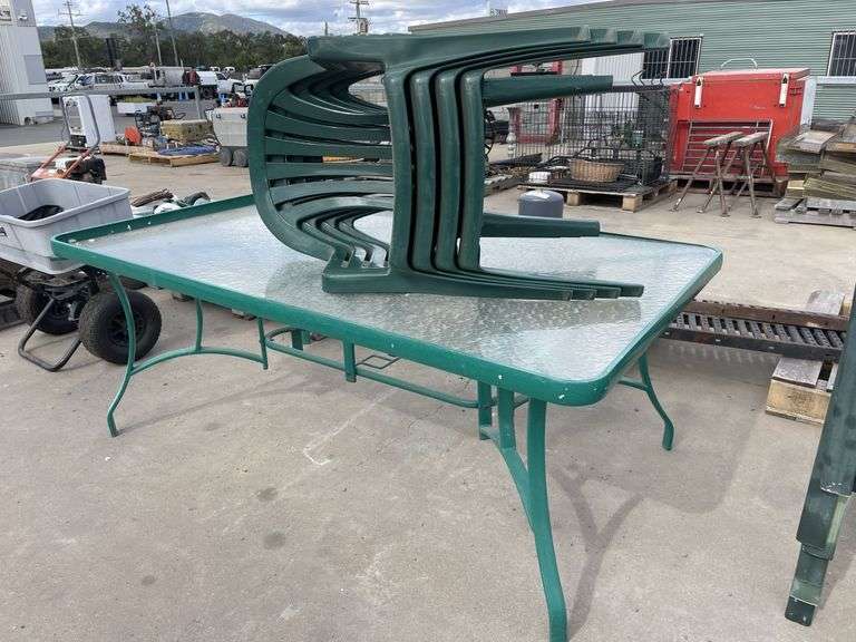 Outdoor Glasstop table and Plastic Stacker Chairs