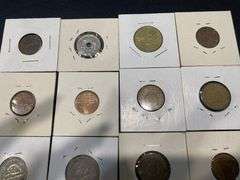 Small Collection of World Coins in Pockets