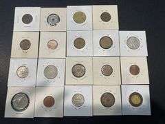 Small Collection of World Coins in Pockets