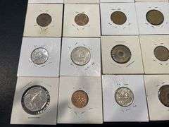 Small Collection of World Coins in Pockets