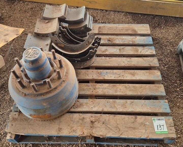 Brake Drums and Parts.  Axle is bent.