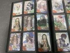 3x Black Folders inc Demon Slayer Cards, Pokémon Cards etc