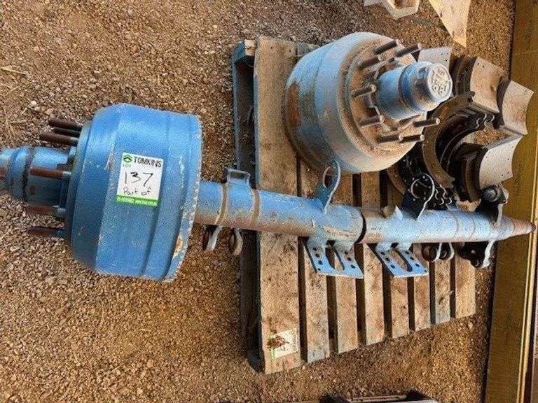 Brake Drums and Parts.  Axle is bent.
